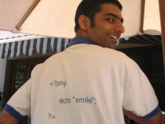 Kaustubh Srikanth showing the PHP code printed on the back of his t-shirt