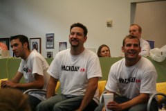 Three smiling hackers in Hack Day t-shirts, our new Canadian friends